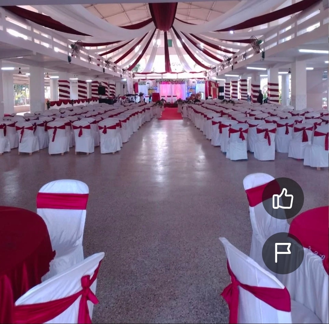 Grand Enclosed Banquet Hall at Kalathur Gardens — 1,500 seat capacity with red carpet aisle