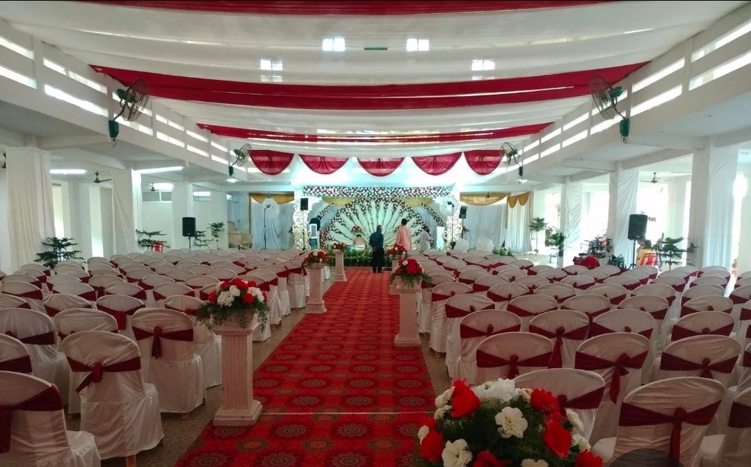 AC Kalyan Mantap ceremony hall at Kalathur Gardens with mandap stage and red carpet